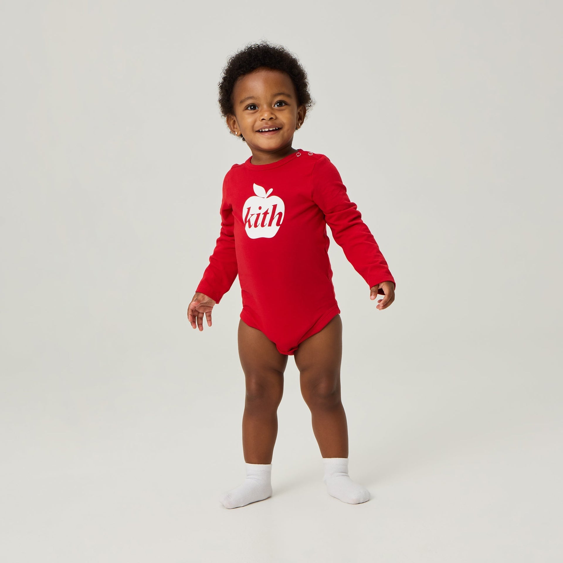 Kith Baby Apple Logo Graphic Long Sleeve Bodysuit - Fame