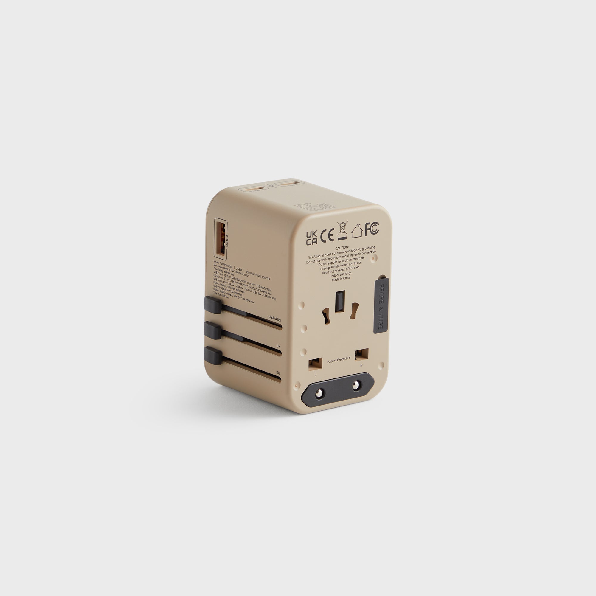 Kith for TUMI 65W Universal Power Adapter - Quicksand – Kith Europe