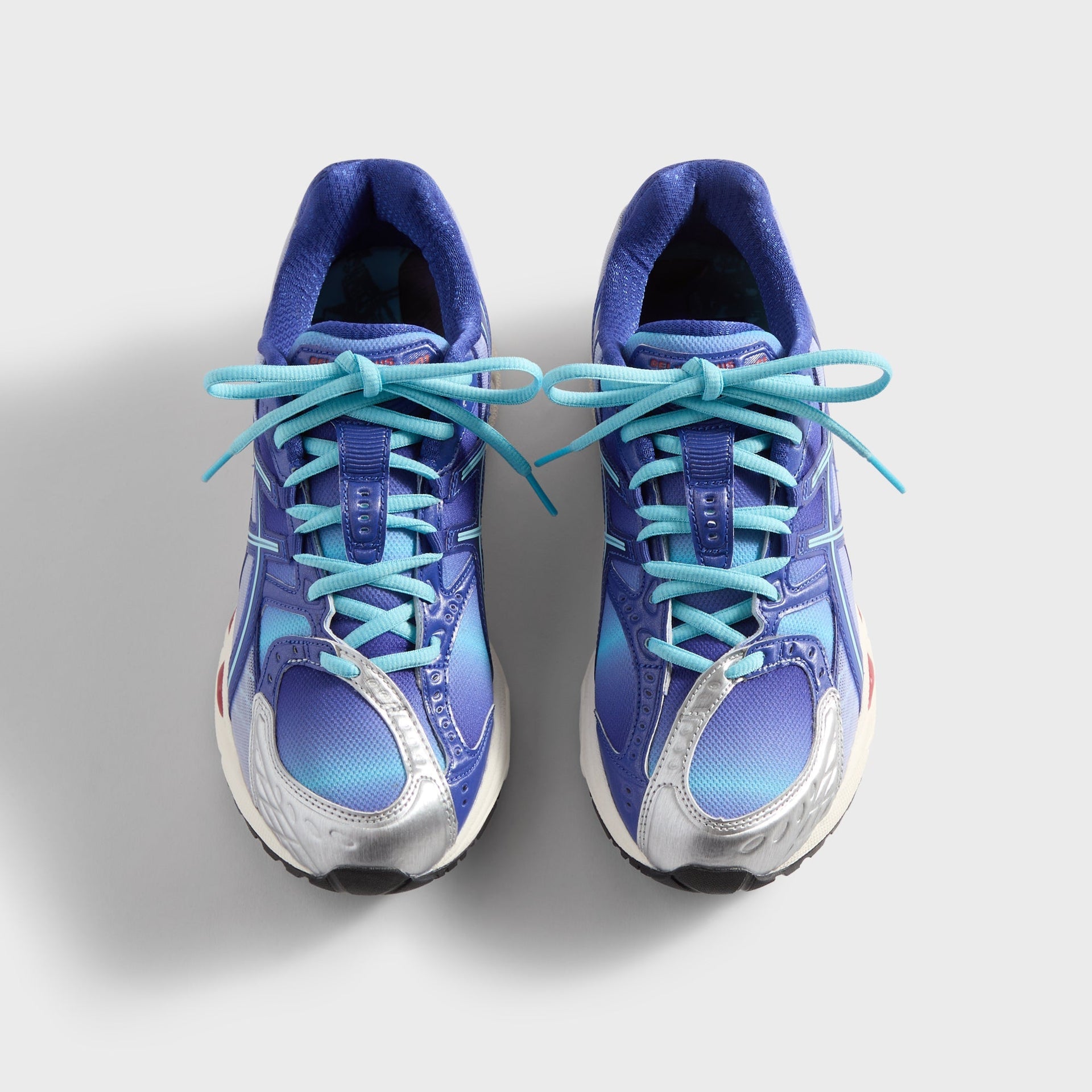 Marvel vs. Capcom | Kith for ASICS Gel-Nimbus 10.1 Iron Man vs. Mega Man Double Box - Italian Straw / Molten Lava / Mazarine Blue - PH