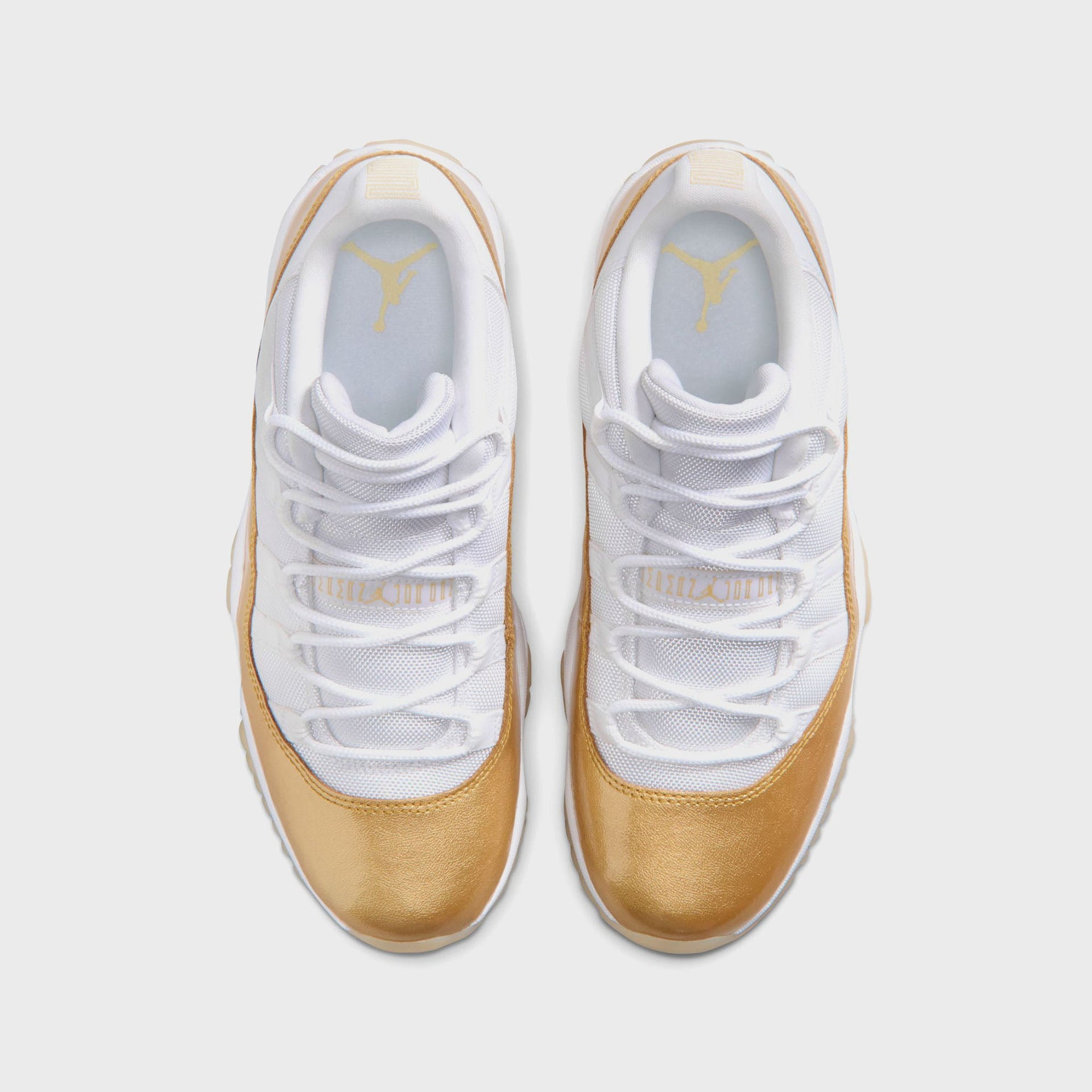 Jordan WMNS Air Jordan 11 Low - White / Metallic Gold