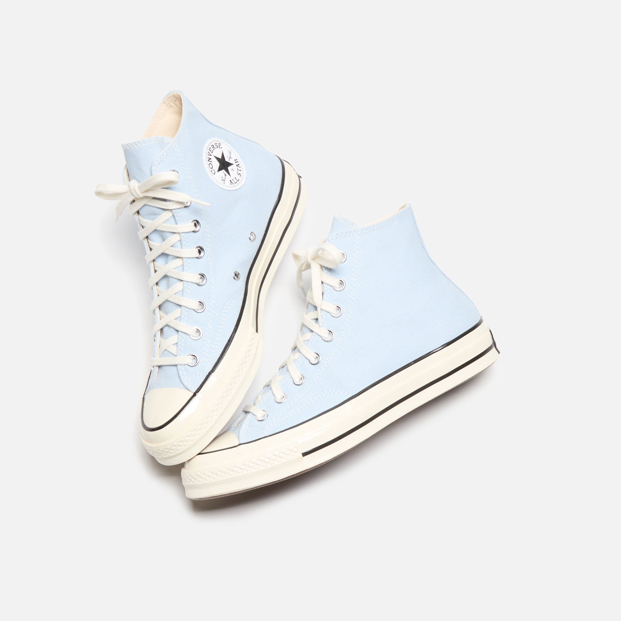 black and blue converse high tops