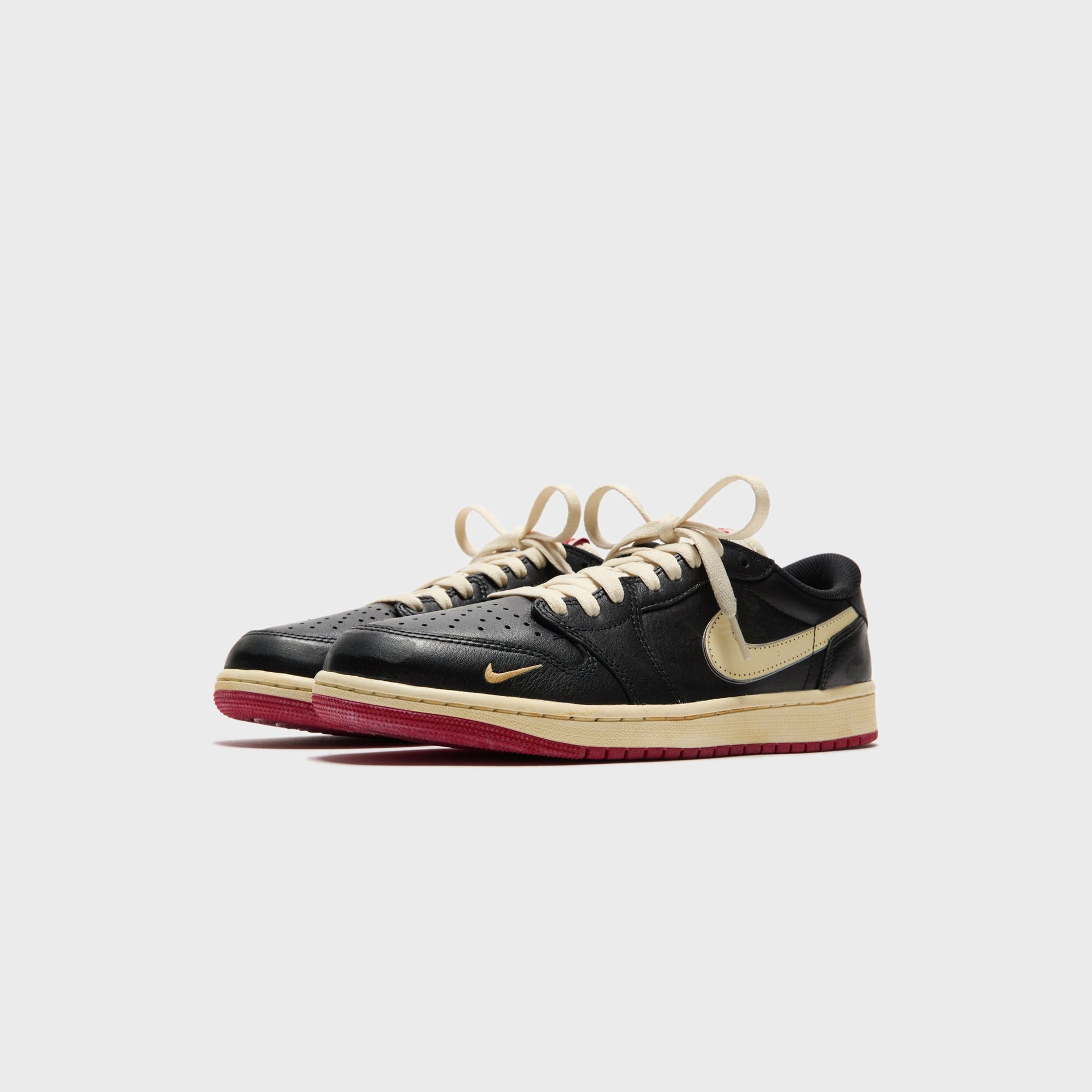 Jordan x Nigel Sylvester Air Jordan 1 Low OG - Nitro Black / Muslin / Varsity Red