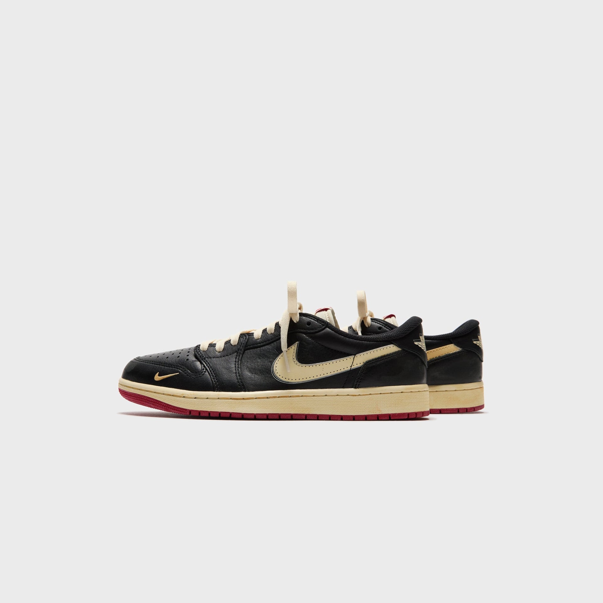 Jordan x Nigel Sylvester Air Jordan 1 Low OG - Nitro Black / Muslin / Varsity Red