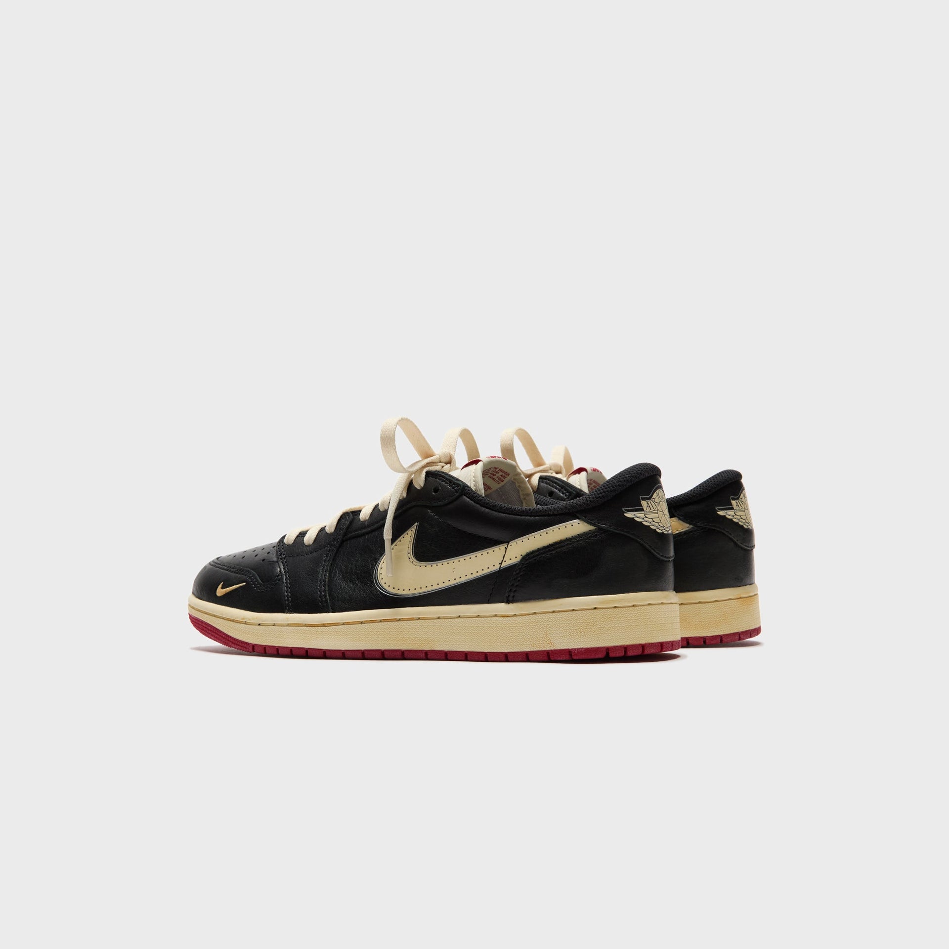 Jordan x Nigel Sylvester Air Jordan 1 Low OG - Nitro Black / Muslin / Varsity Red