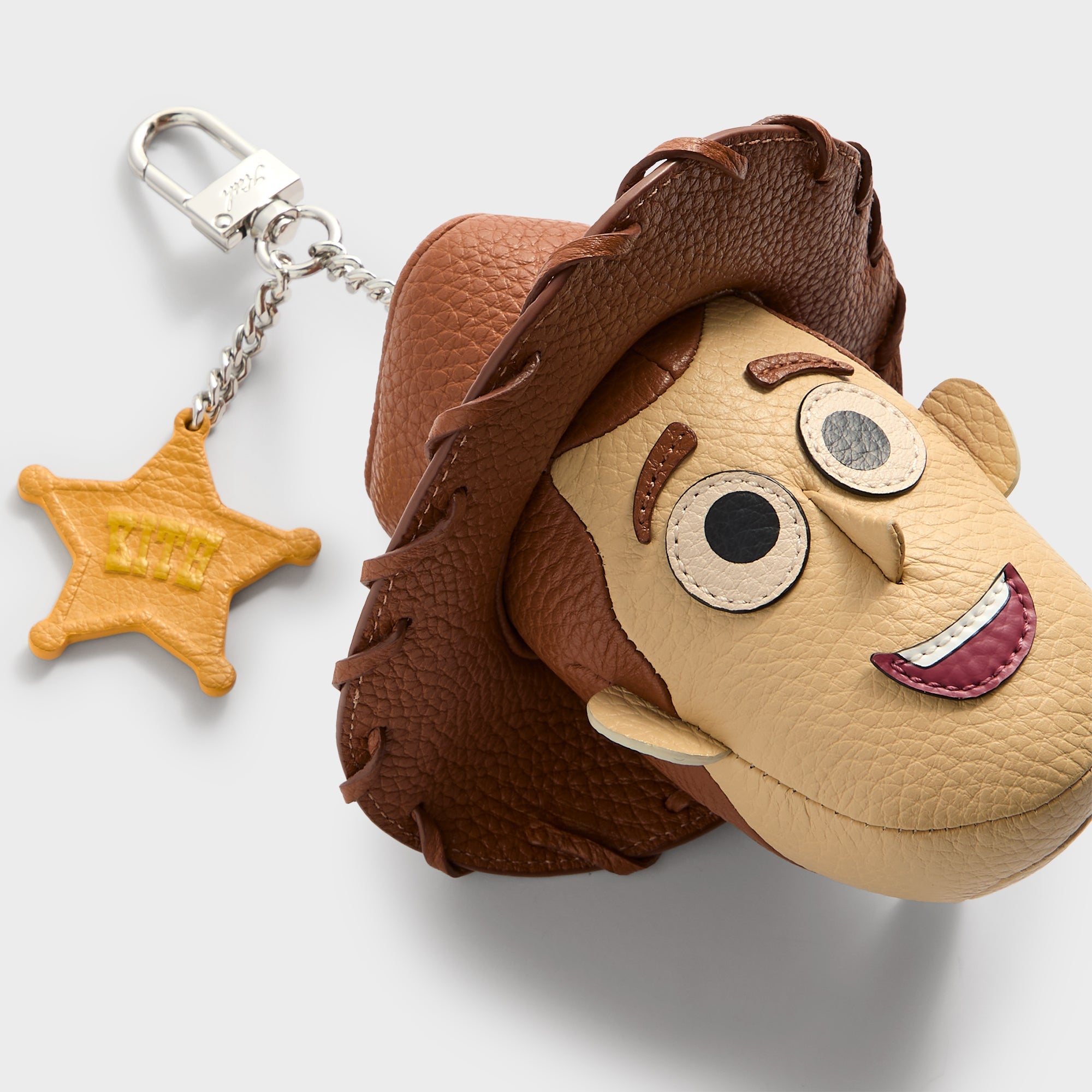 Disney | Kith for Pixar Woody Leather Key Charm - Multi – Kith Europe