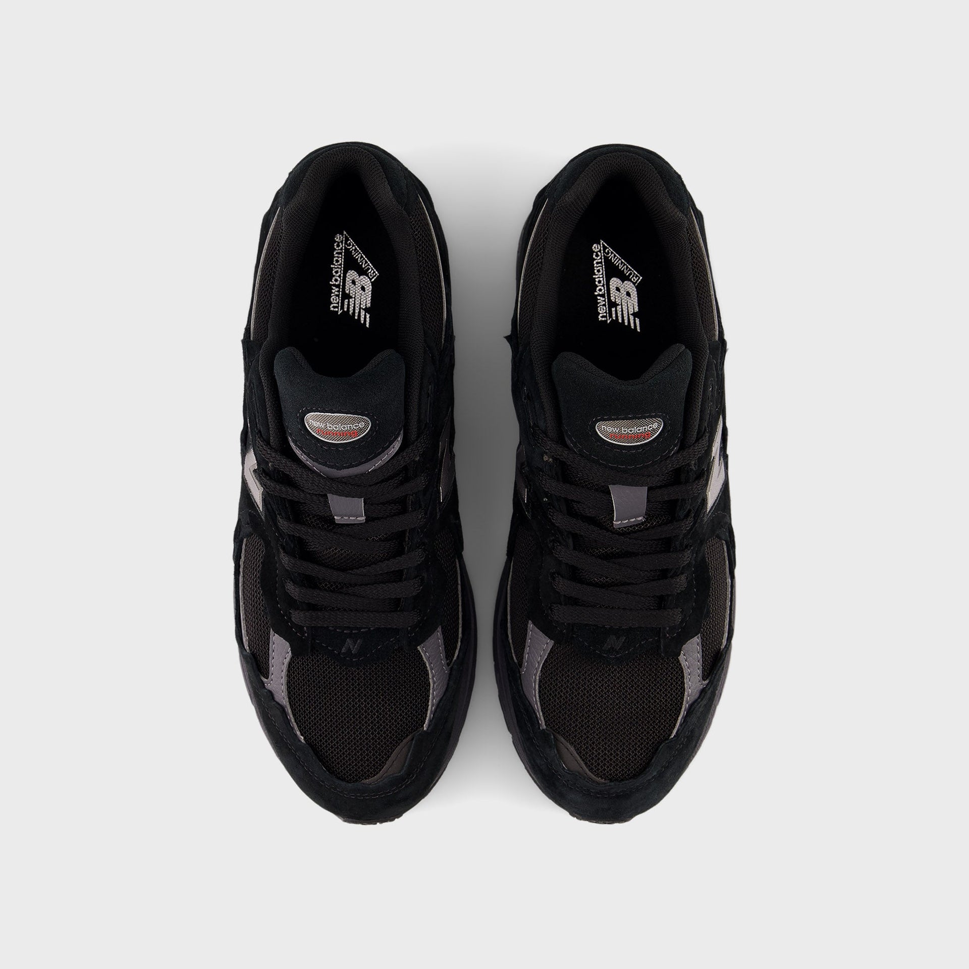 New Balance U2002DX - Black / Magnet