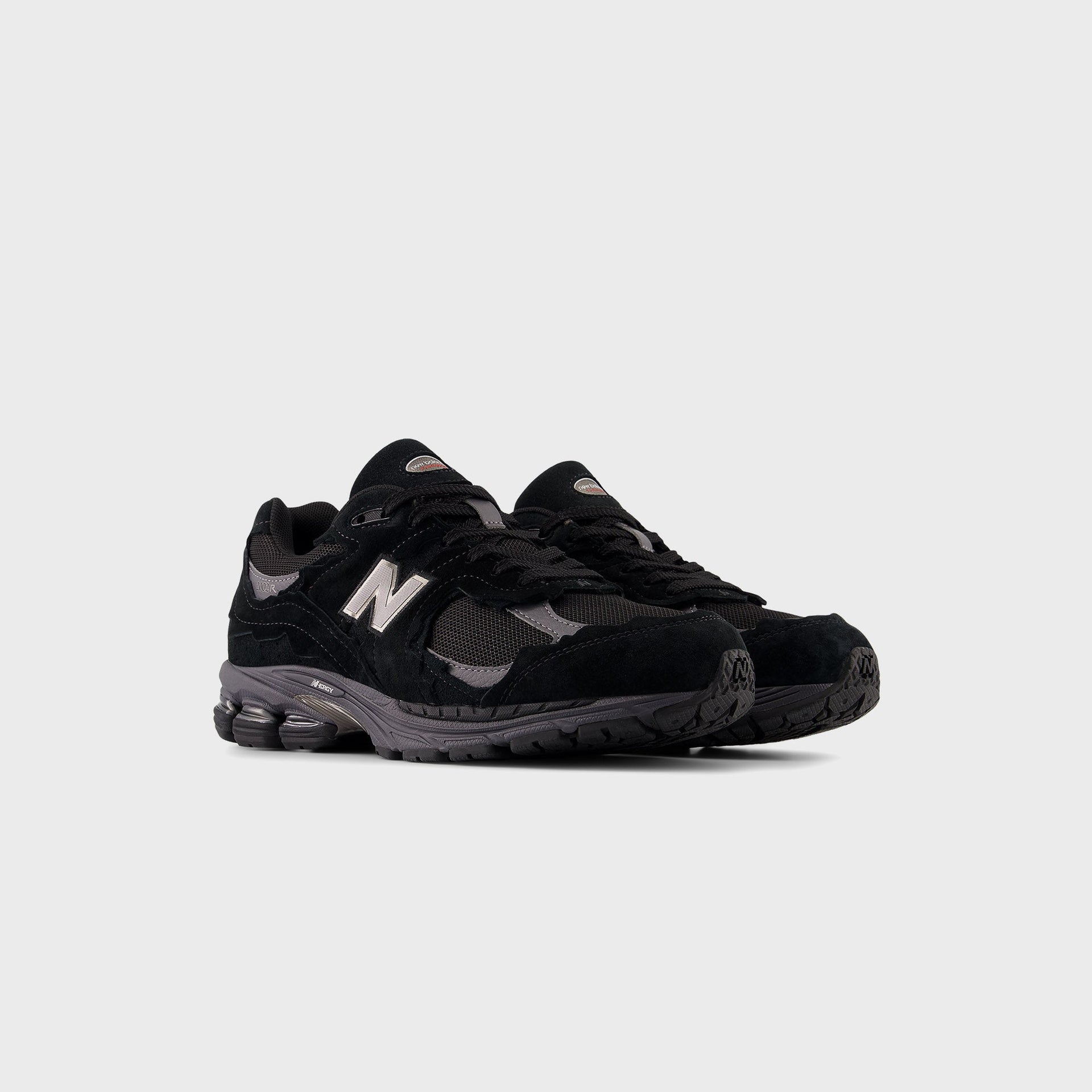 New Balance U2002DX - Black / Magnet