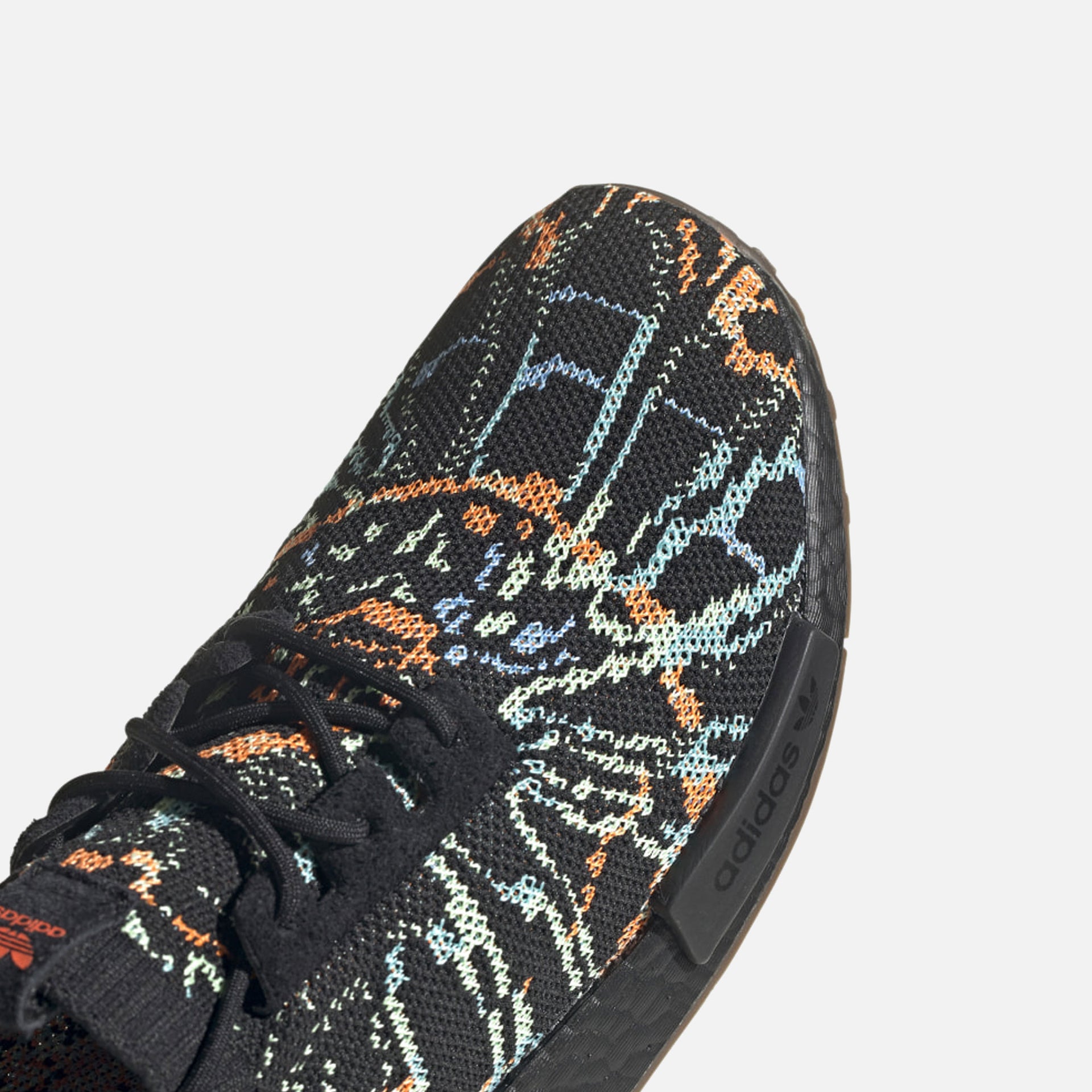 adidas NMD R1 Primeknit - Core Black / Gum