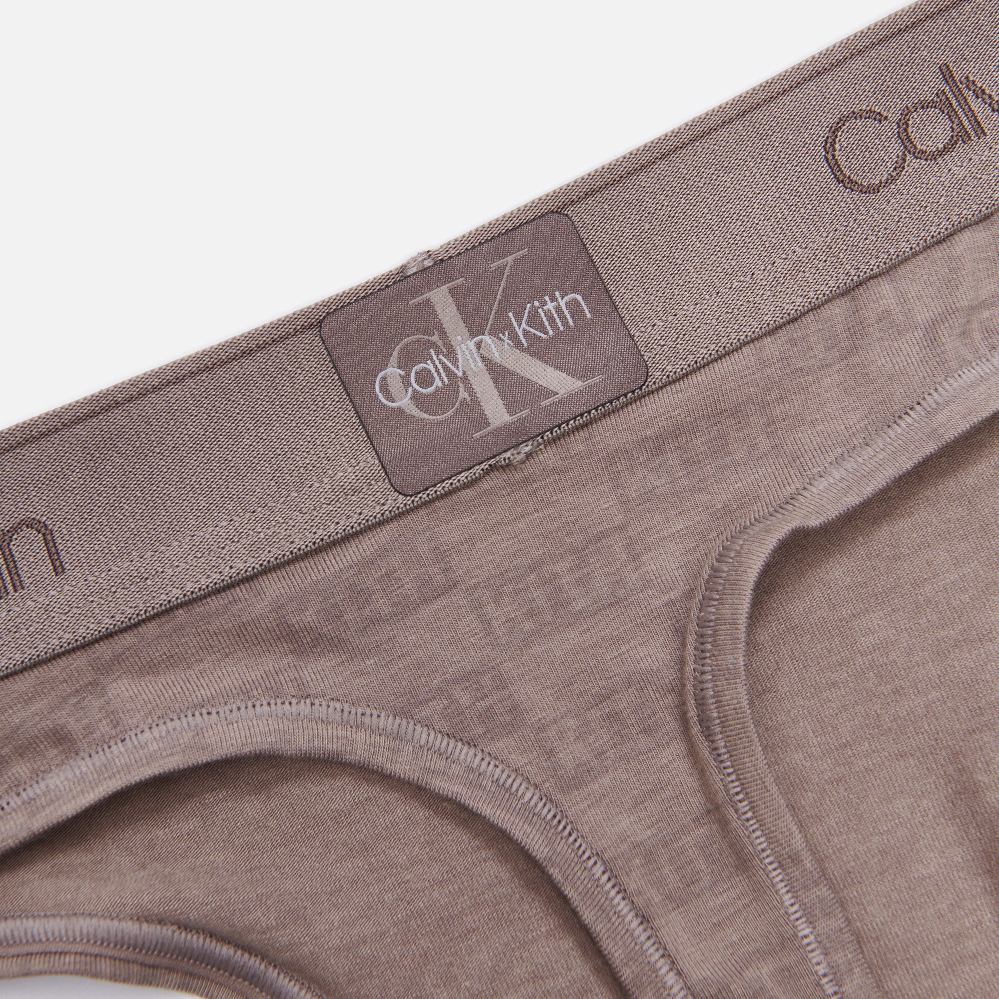 【KITH】Women for   Thong（送料込み） QF6331-051-FRONT.jpg?v=1726850370